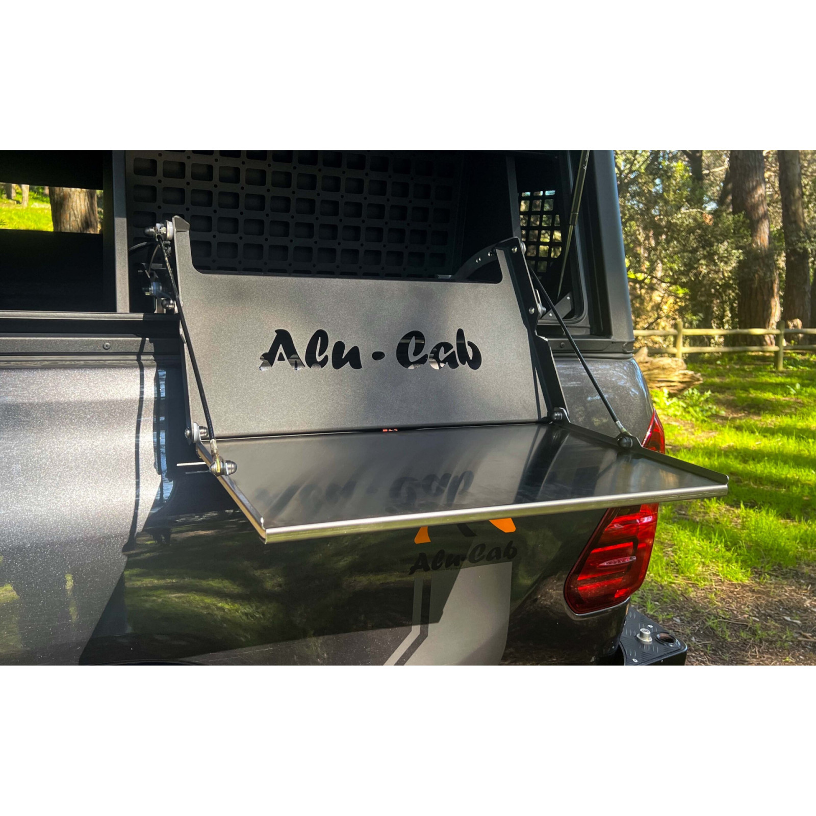 Tablette pliante pour compartiment latéral hard-top Alu-Cab 
