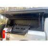 Tablette pliante pour compartiment latéral hard-top Alu-Cab 