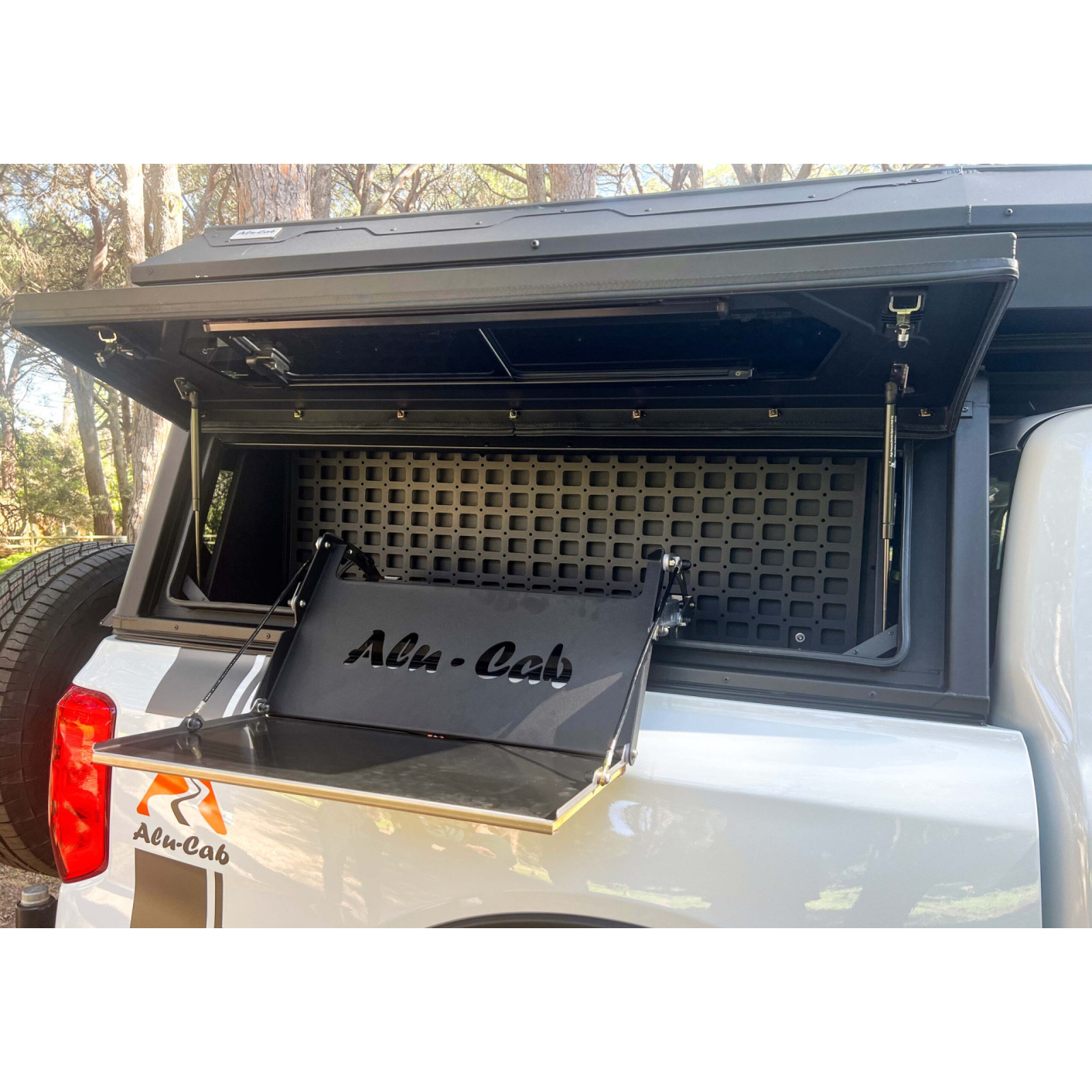 Tablette pliante pour compartiment latéral hard-top Alu-Cab 