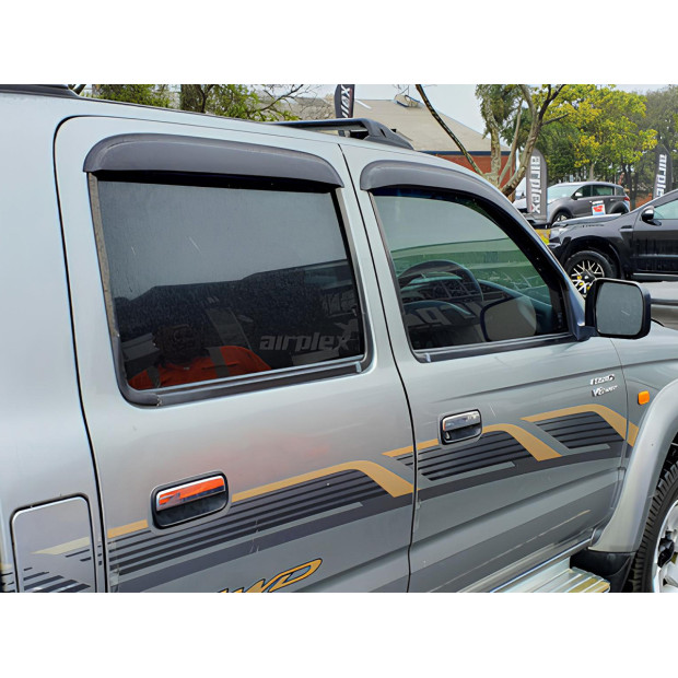 Jeu 4 déflecteurs vitre avant et arrière Toyota Hilux 1998-2004