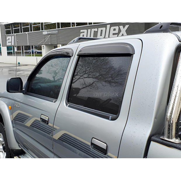 Jeu 4 déflecteurs vitre avant et arrière Toyota Hilux 1998-2004