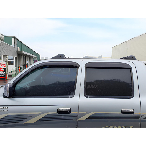 Jeu 4 déflecteurs vitre avant et arrière Toyota Hilux 1998-2004